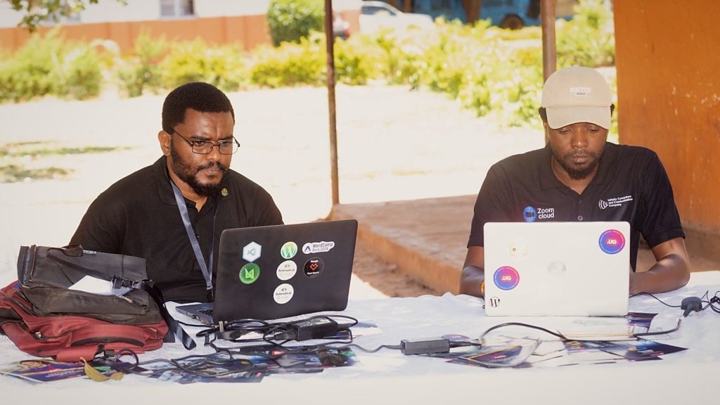 Rashid Migadde at the laptop during WordCamp Lira 2026
