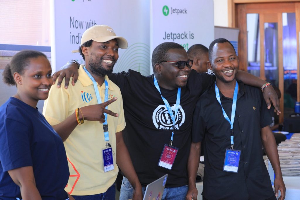 Rashid Migadde with fellow attendees and speakers at WordCamp Masaka 2026