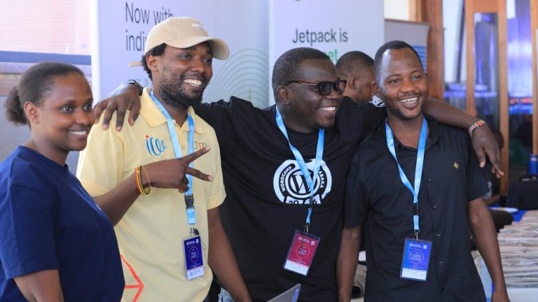 Rashid Migadde with fellow attendees and speakers at WordCamp Masaka 2026