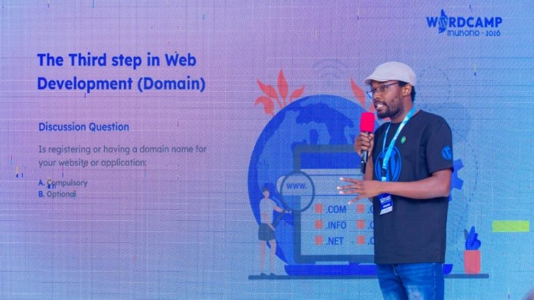 Rashid Migadde presenting "The Third Step in Web Development (Domain)" at WordCamp Mukono 2026